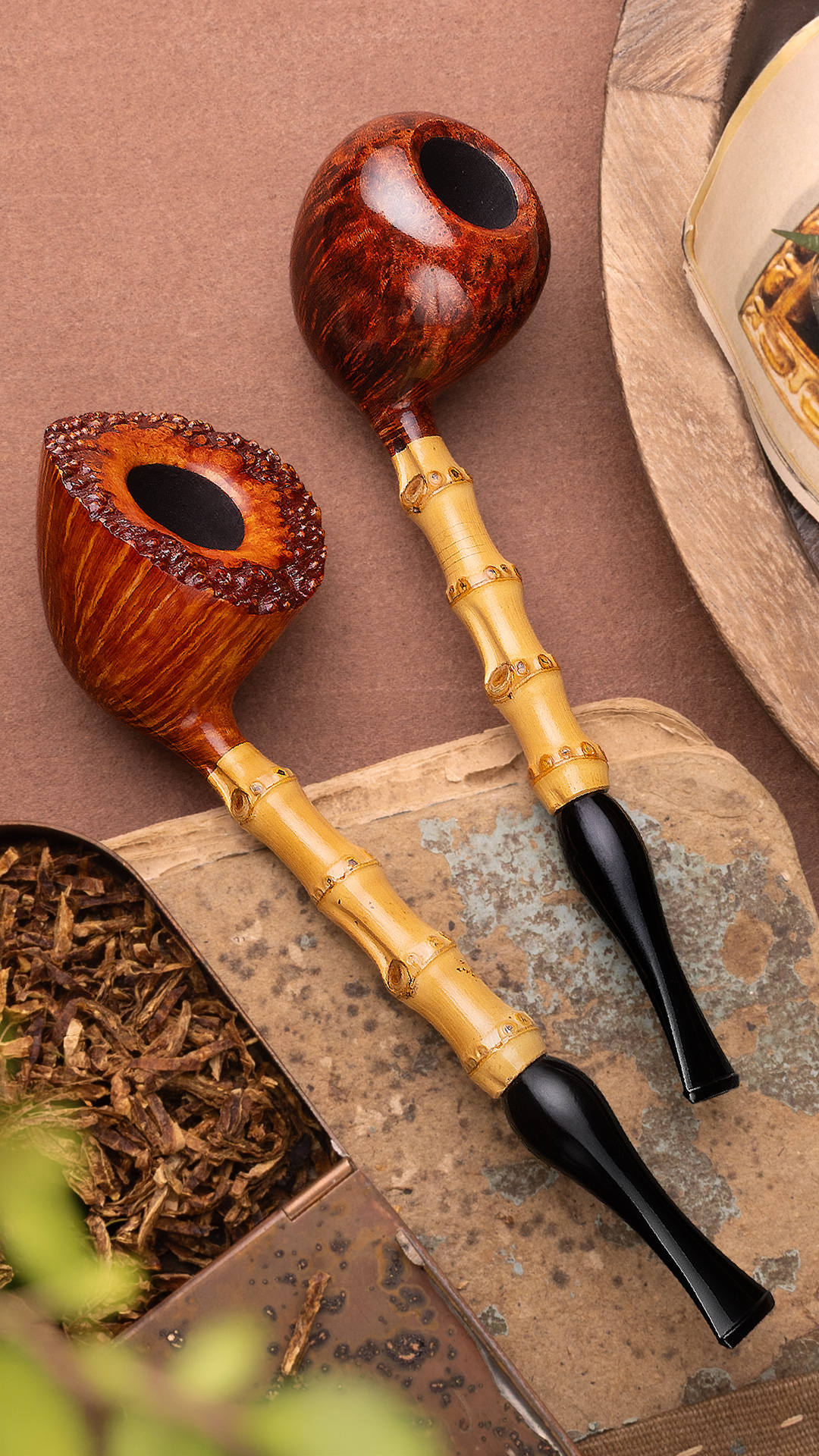 Tsuge Ikebana pipes with bamboo shanks, one carved and one smooth
